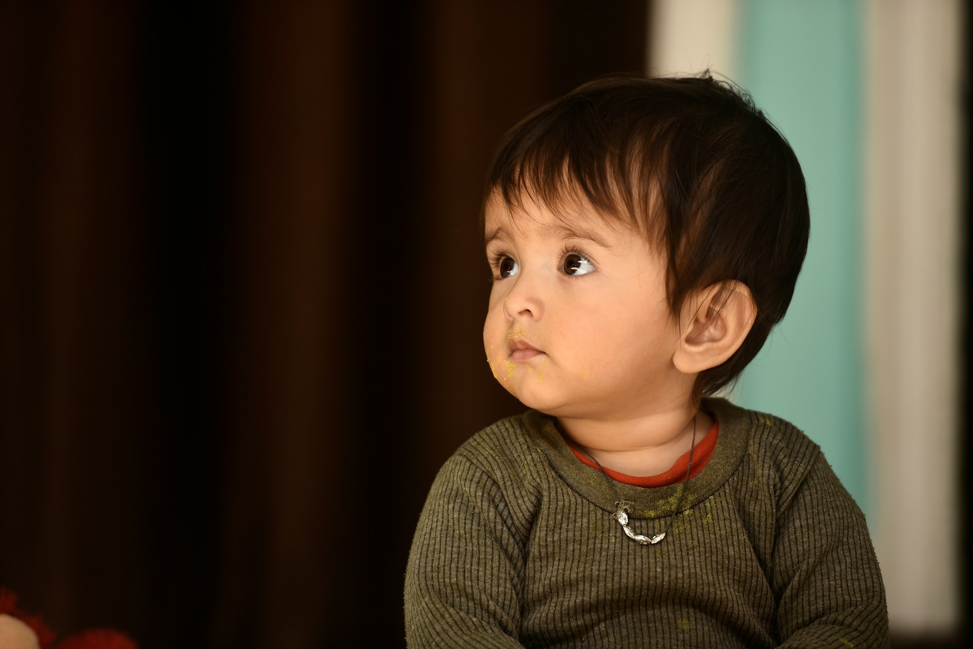 Adorable Indian baby girl at home